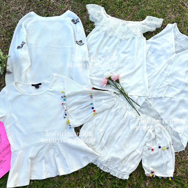 เสื้อแฟชั่นขาว ป้ายจรวด
